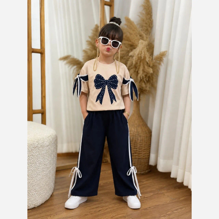 ست تیشرت و شلوارک دخترانه طرح پاپیون مروارید سایز 45 تا 65