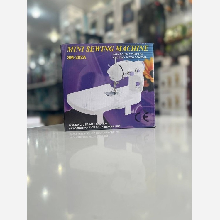 مینی چرخ خیاطی دارای میز تاشو مدل SM202A